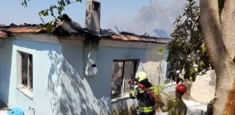 Muğla'da ormanlık alanda çıkan yangın evde hasara neden oldu