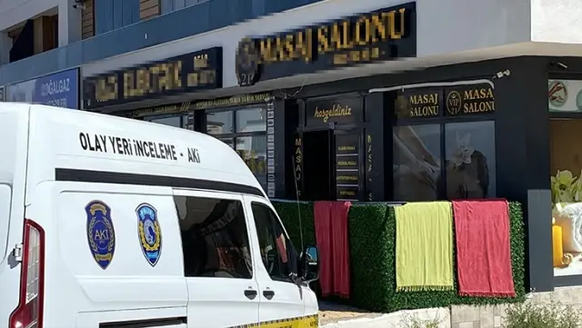 The young woman was found stabbed to death in the massage salon.