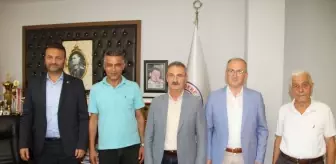 Doğu Karadeniz Belediyeler Birliği Genel Sekreteri Mehmet Şentürk, Yağlıdere Belediye Başkanı Yaşar İbaş'ı ziyaret etti