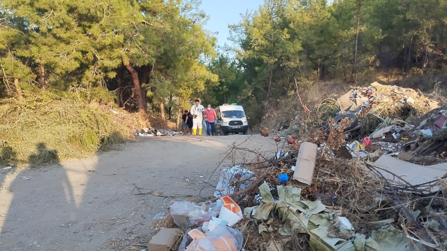 A male body was found in a barrel in the garbage dump area