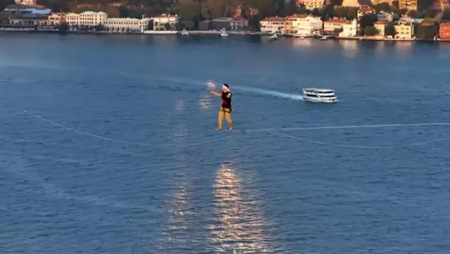 Historic moments in the Bosphorus Strait! Walking across from Asia to Europe on a rope.