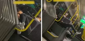 Metrobüste şehir magandası! Ayakkabılarını çıkarıp 3 kişilik koltuğa yattı