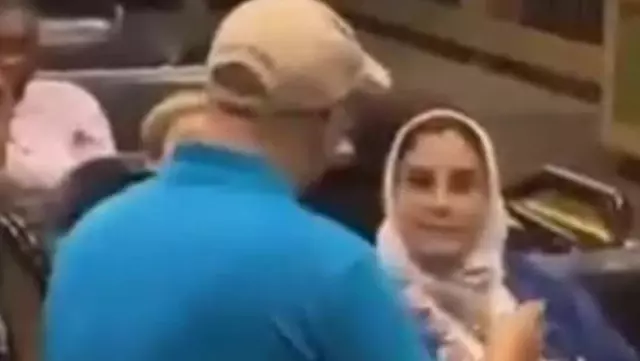 A Muslim woman was removed from a roller coaster at a theme park in the USA due to her headscarf.