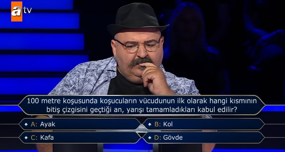 100 metre koşusunda koşucuların vücudunun ilk olarak hangi kısmının bitiş çizgisini geçtiği an, yarışı tamamladıkları kabul edilir?