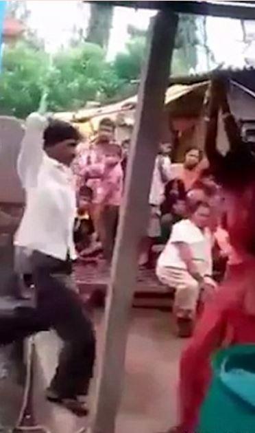 A husband in India, whose wife cheated on him, tied her and her lover to a tree and beat them