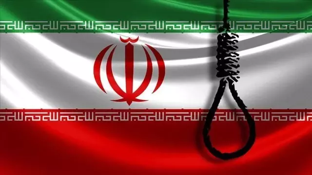 Two armed robbers who killed a police officer in Iran were executed.