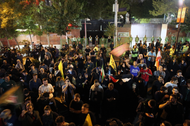 Thousands of Iranians took to the streets to celebrate with takbirs as missiles rained down on Israel