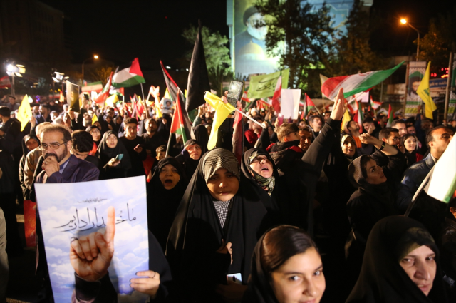 Thousands of Iranians took to the streets to celebrate with takbirs as missiles rained down on Israel