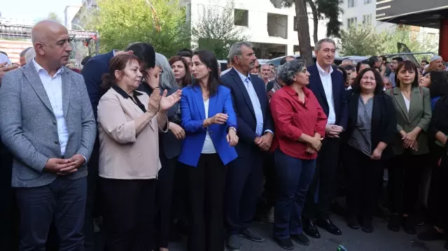 At the DEM Party demonstration, the crowd, inspired by the party leader, chanted PKK slogans, and there are arrests taking place.