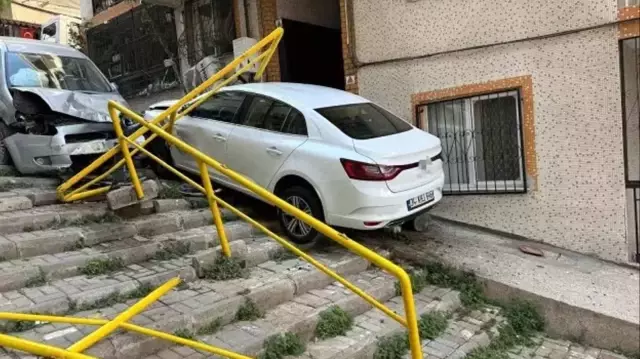 The car, unable to control its speed, flew off the stairs.