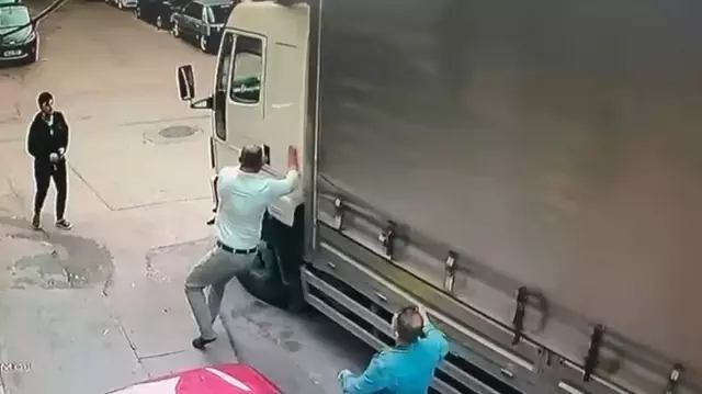 He chased after the moving truck and managed to stop it just before an accident.