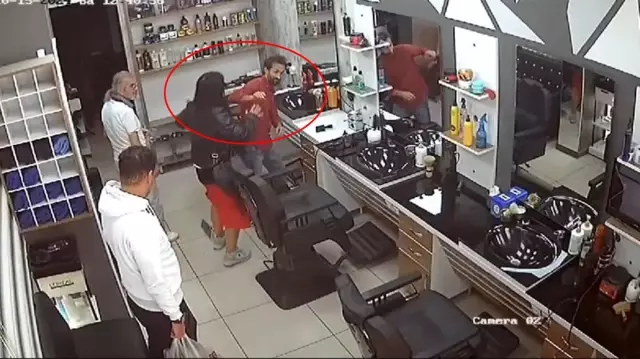 A woman obsessed with her ex-husband stormed into his workplace and attacked.