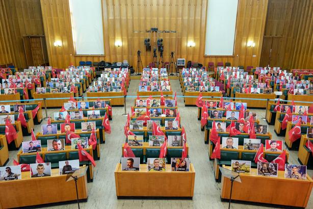 In the İYİ Party, which reacted to Bahçeli's call, photos of martyrs were placed on all desks before the meeting