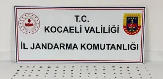 Kocaeli'de Tarihi Eser Kaçakçılığı Operasyonu: 100 Sikke ve 15 Obje Ele Geçirildi