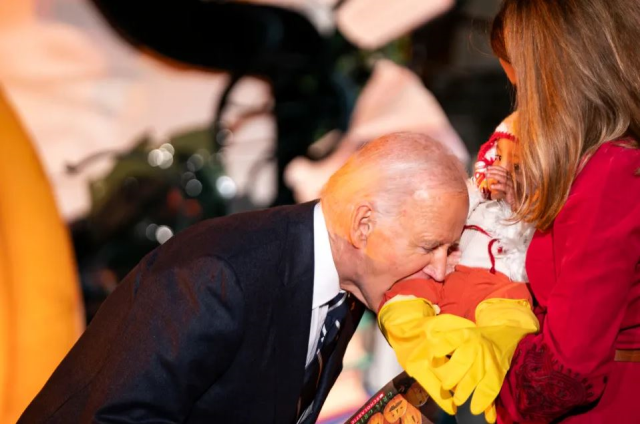 U.S. President Biden pretended to bite three babies at the White House Halloween party