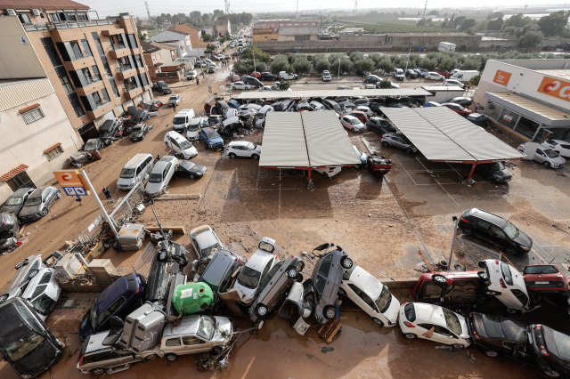 The death toll from the flood disaster in Spain has risen to 211