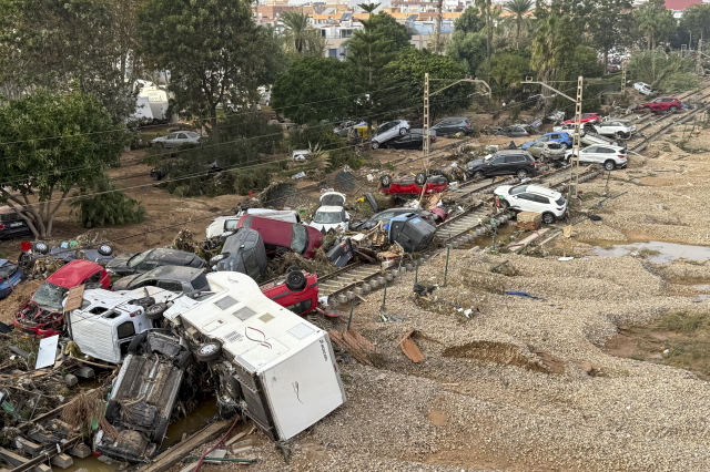 The death toll from the flood disaster in Spain has risen to 211