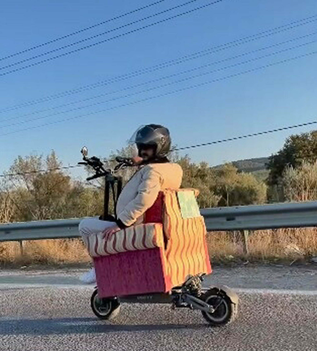 Creative Solution After Losing His License: Mounted a Seat on the Scooter