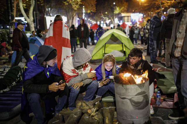 Police intervention against protesters blocking the road and setting up tents in Georgia