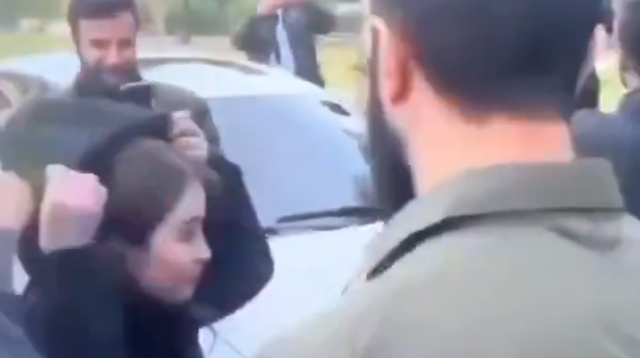 Instruction from HTS leader Jolani to the woman: 'Cover your head'