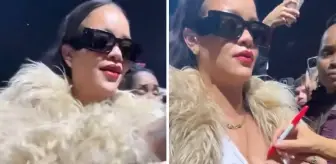 Rihanna konserde göğsünü açıp Mariah Carey'e imzalattı