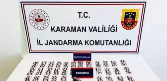 Karaman'da Jandarma Operasyonu: uyuşturucu hap ve ruhsatsız tabanca ele geçirildi