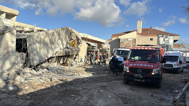 4-story building collapsed, excavator operator trapped under rubble