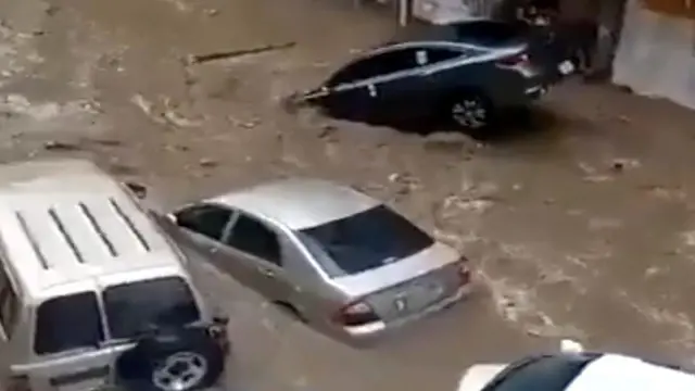 Mecca is underwater! Cars and trash containers were swept away like toys