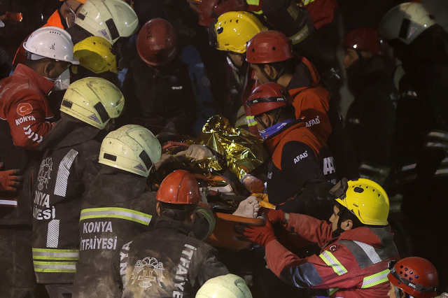 Two people were rescued alive from the rubble of the collapsed three-story building in Konya