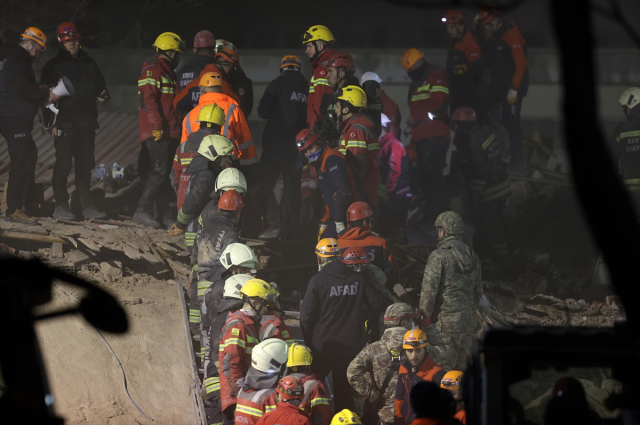 Two people were rescued alive from the rubble of the collapsed three-story building in Konya