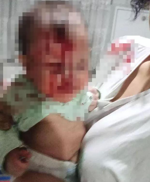 The crazed father threw his 4-month-old baby onto the glass coffee table