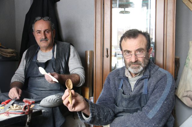 Retired Halit Yıldızeli from Sivas is apprenticing in the art of wooden spoon carving