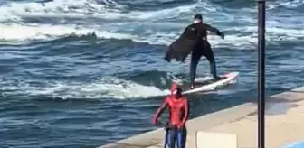 Bebek'te Batman sörf yaptı, Spider Man scooter kullandı