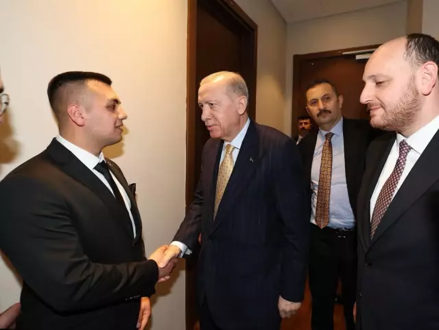 President Erdoğan pinned the party badge on Recep Tayyip Erdoğan who joined the AK Party