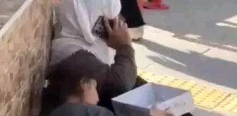 Dilenci Kadının Lüks Telefon ile Sohbeti Şaşkınlık Yarattı