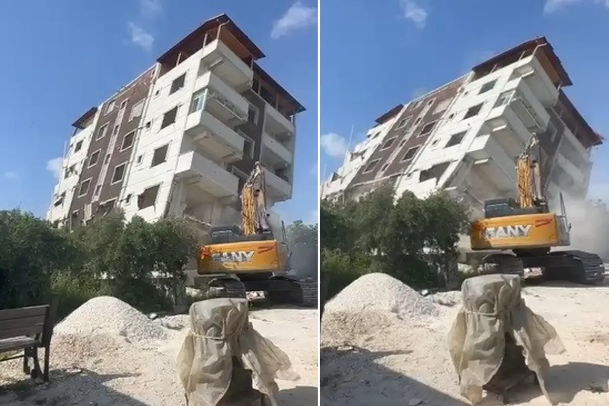 Depremde hasar alan 7. katlı bina iş makinesiyle yıkıldı