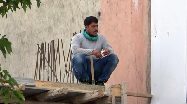 Construction workers in Batman watched the May 1 celebrations while working