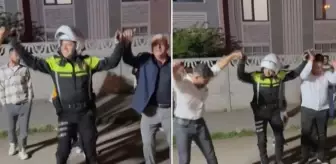 Düzce'de trafik polisi, düğün nedeniyle trafiğe kapanan yolu açtıktan sonra halaya katıldı