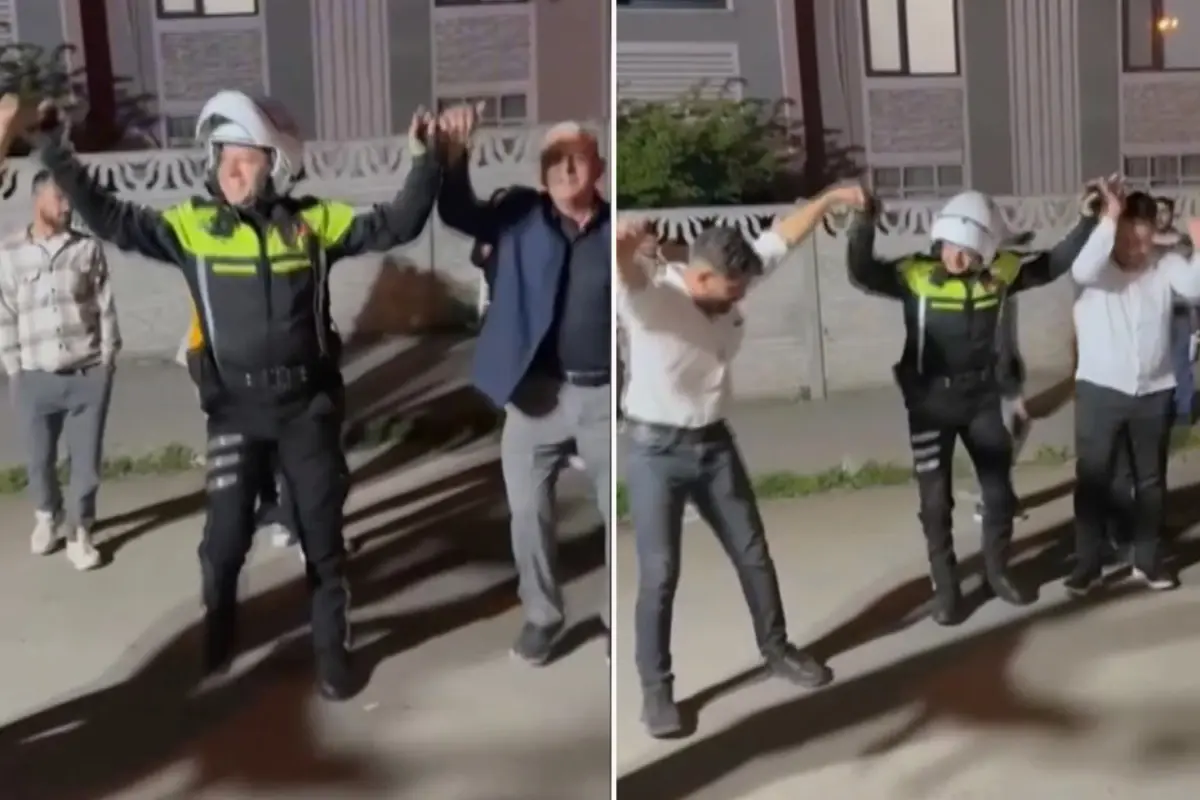 Düzce'de trafik polisi, düğün nedeniyle trafiğe kapanan yolu açtıktan sonra halaya katıldı