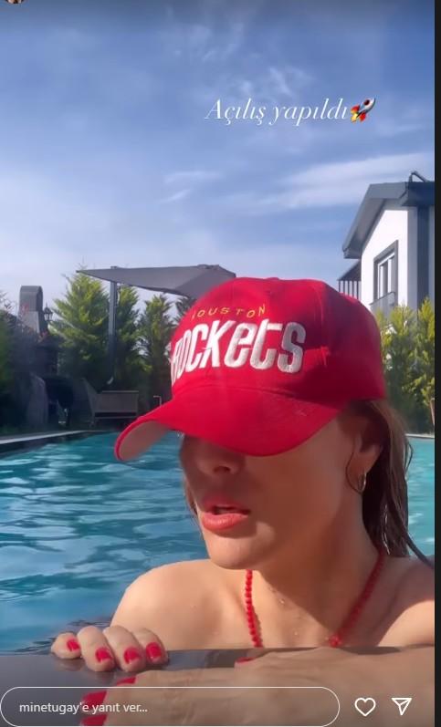 Mine Tugay opened the summer season with her red swimsuit