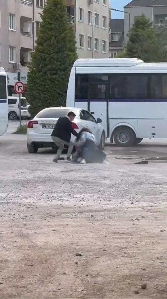 Two young girls fought in the parking lot