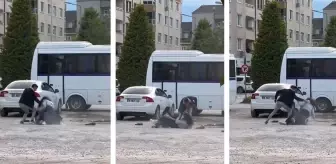 İki genç kız otoparkta yumruk yumruğa kavga etti