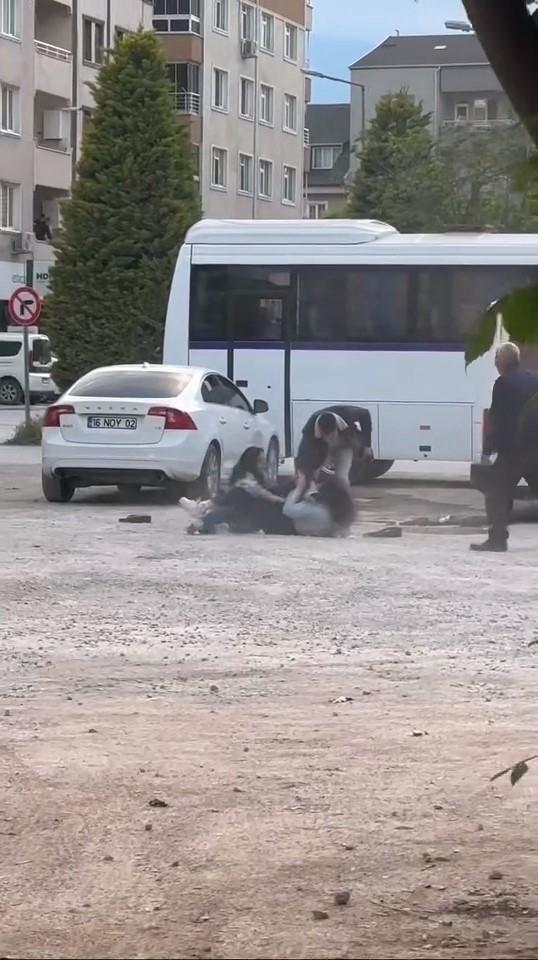 Two young girls fought in the parking lot