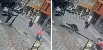 Telefonla konuşurken yaslandığı sokak lambası bir kadının üzerine devrildi