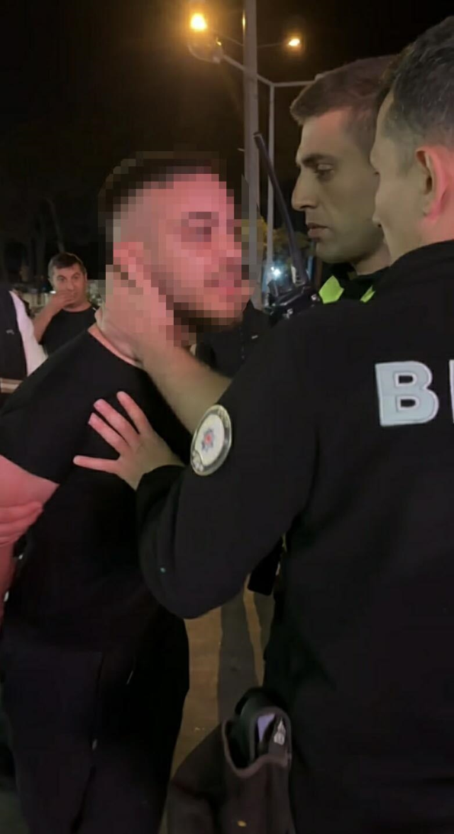 Initially resisted, then threatened and insulted the police with friends he called to the scene