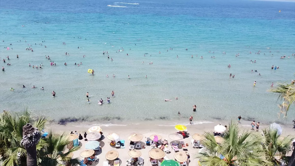 Aydın'da Sıcak Havada Sahillerde Yoğunluk, Kent Merkezinde Sakinlik