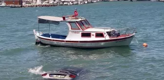 Ayvalık'ta Kontrolden Çıkan Otomobil Denize Düştü