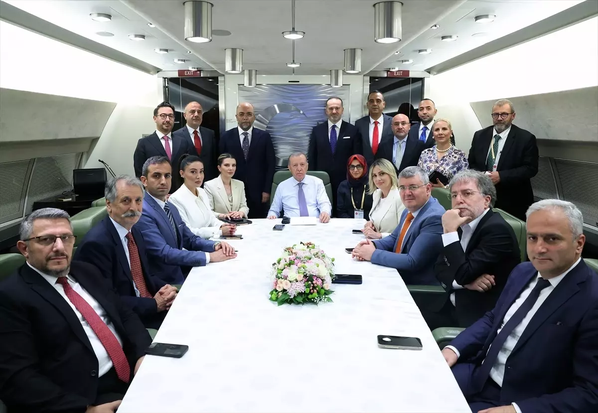 Cumhurbaşkanı Erdoğan, KKTC dönüşü gazetecilerin sorularını yanıtladı: (1)
