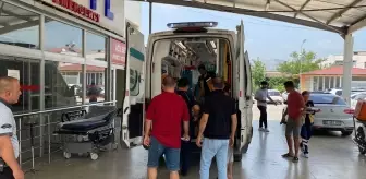 Kozan'da devrilen traktördeki 2 kişi yaralandı
