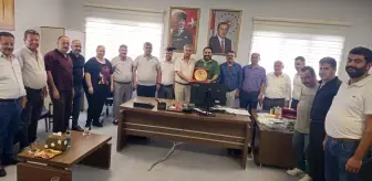 Muhtarlardan Defne Devlet Hastanesi Başhekimi Kavvasoğlu'na ziyaret